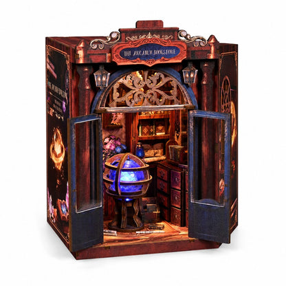A miniature wizarding shop diorama titled 'The Astronomy Shop' with open doors revealing a detailed interior featuring a glowing blue crystal ball, shelves, and magical props, set against a plain white background.