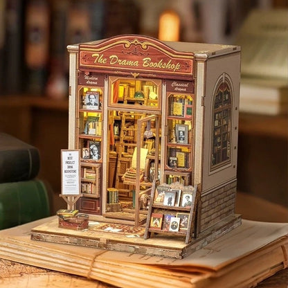 Wooden book nook model of a theater-inspired bookshop with shelves and books in a study setting