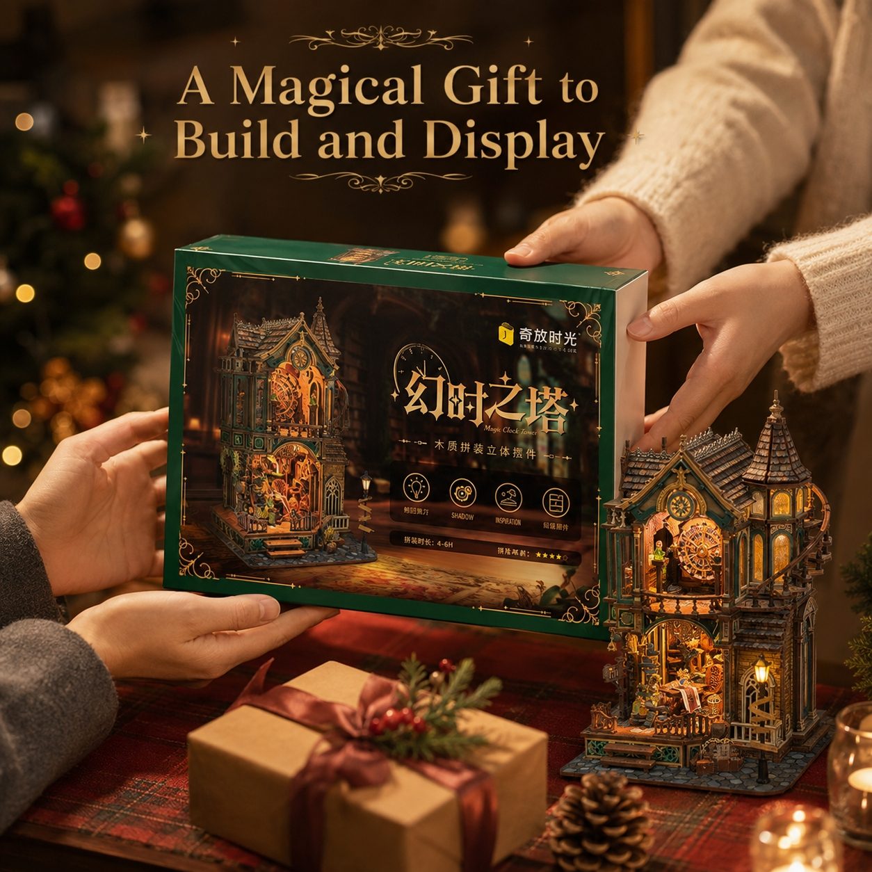 A person holds a green box for a wooden model building kit. The scene is decorated for Christmas, with a lit wooden house model displayed on a table next to a wrapped gift box.