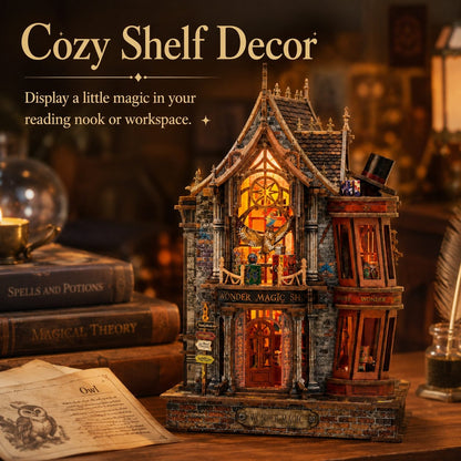 A cozy, illuminated miniature house shelf decor piece styled on a wooden desk with books and a notebook in a warm, atmospheric room setting.