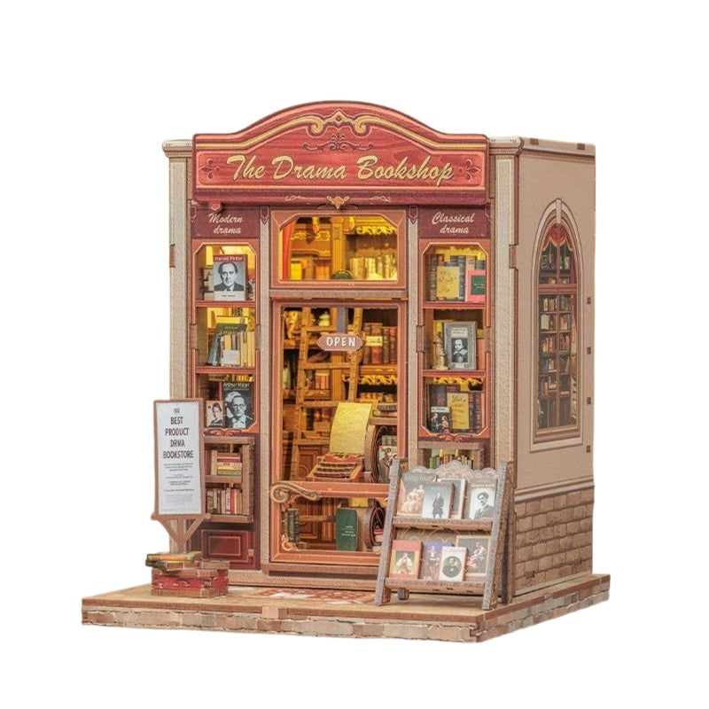 Miniature Model of a theater-inspired bookshop with 'The Drama Bookshop' sign on a white background