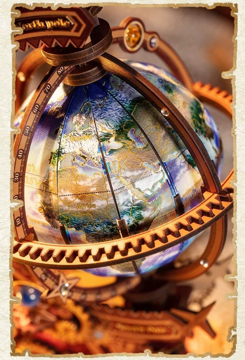 close up a metal globe model with intricate gear elements
