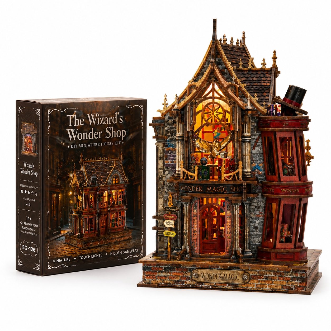 The Wizard's Wonder Shop DIY miniature house kit, showing the retail packaging box next to the fully assembled, illuminated miniature model on a white background.