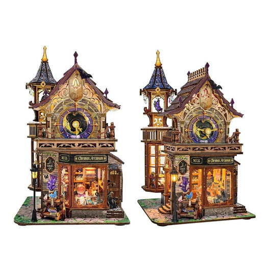 Two intricately designed miniature house of magic shop themed with clock towers on a white background