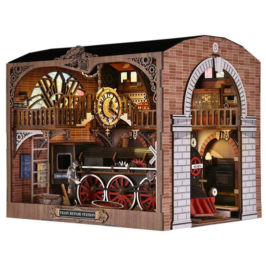 Detailed miniature model of a train repair station with intricate design elements on white background