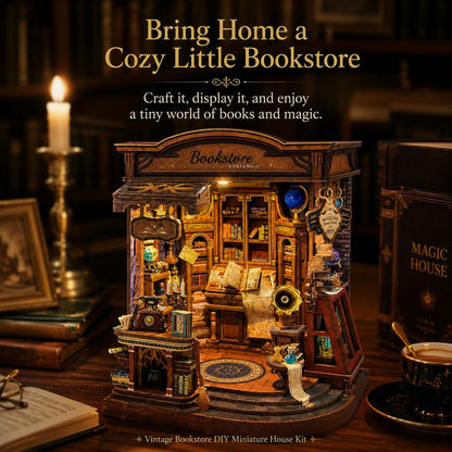 A vintage-style DIY miniature bookshop kit displayed on a wooden table in a cozy, dimly lit room. The product features intricate details like miniature shelves, books, a desk, and a small figure, with warm fairy lights glowing from within.