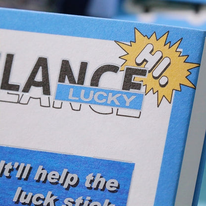 Journaling book with 'LANCE' and 'LUCKY' stickers, featuring a blue and yellow design.