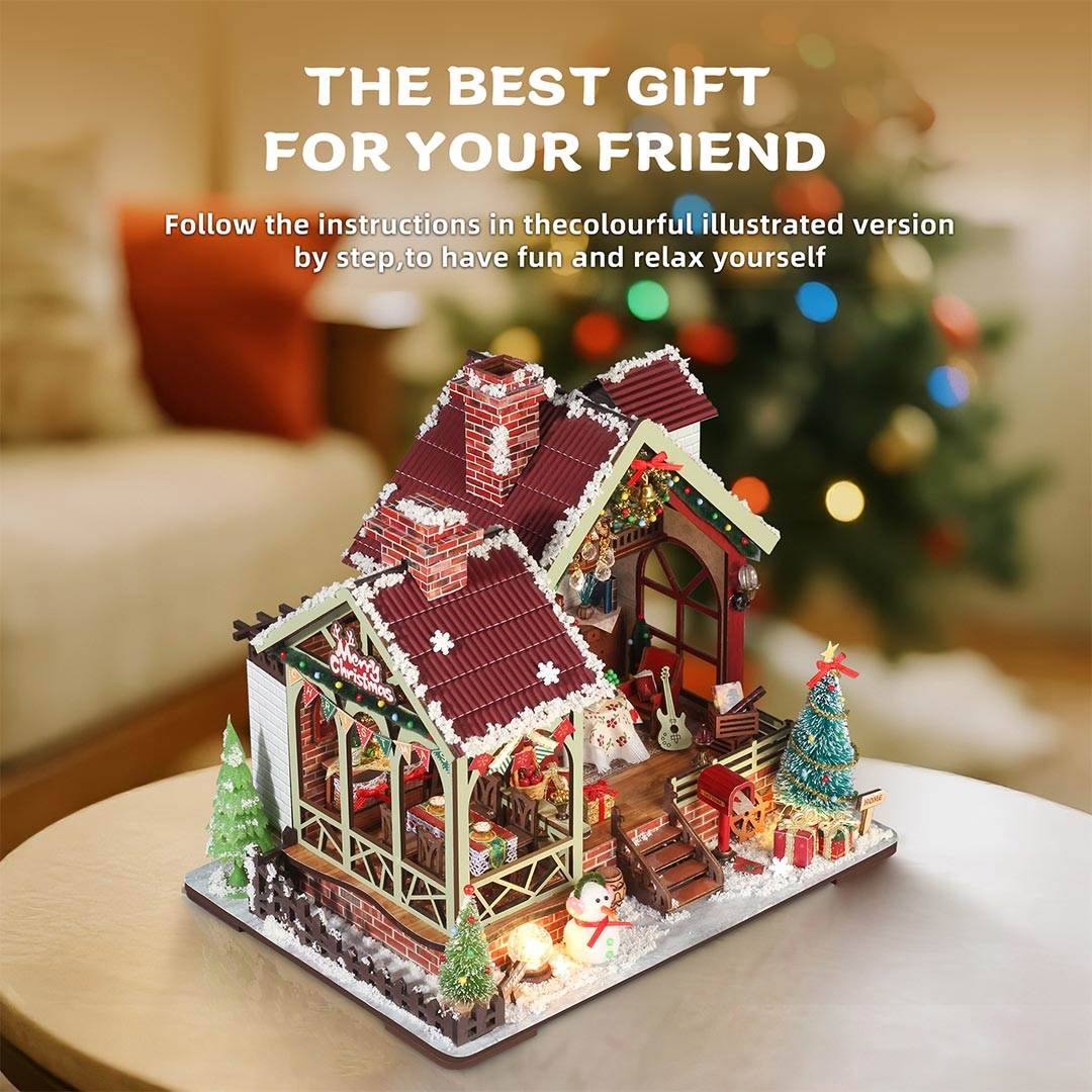 Decorative Christmas house model on a table with festive background
