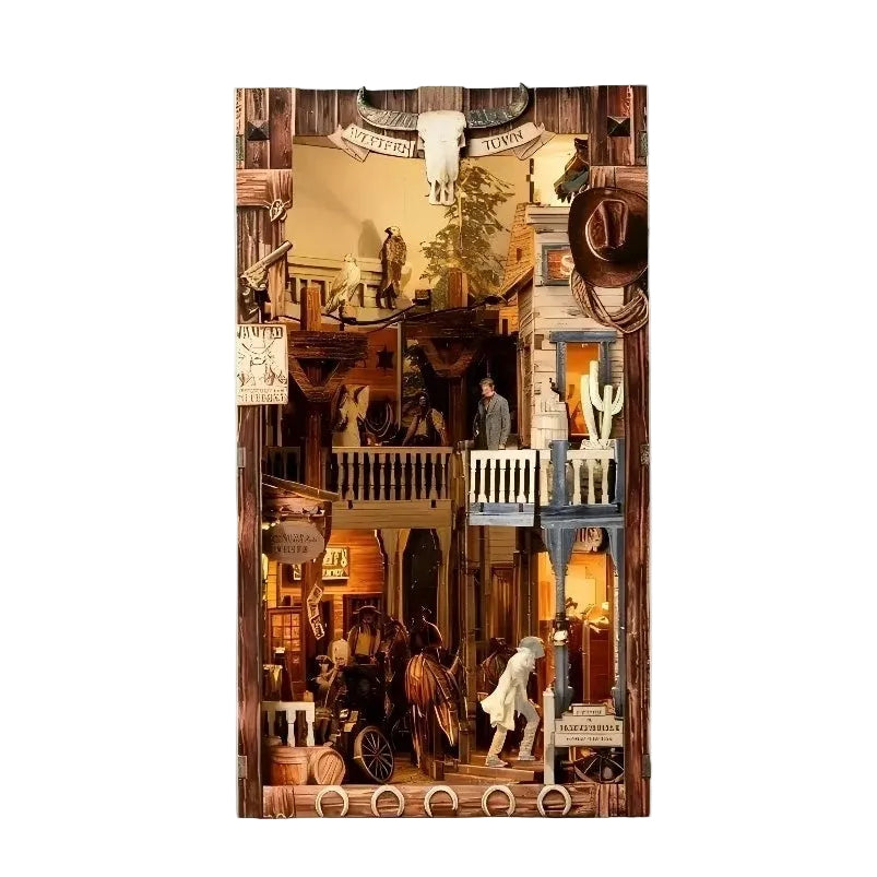 Wooden book nook model of a western town with various figures and details on a light blue background
