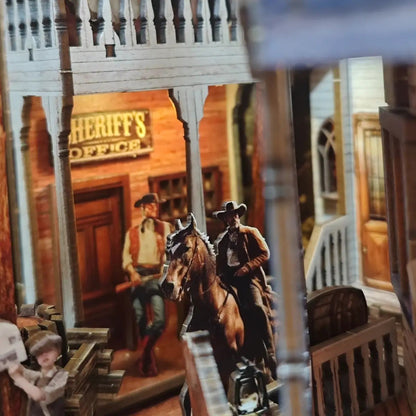 miniature Model of a western scene with a horse and riders in front of a sheriff's office building.