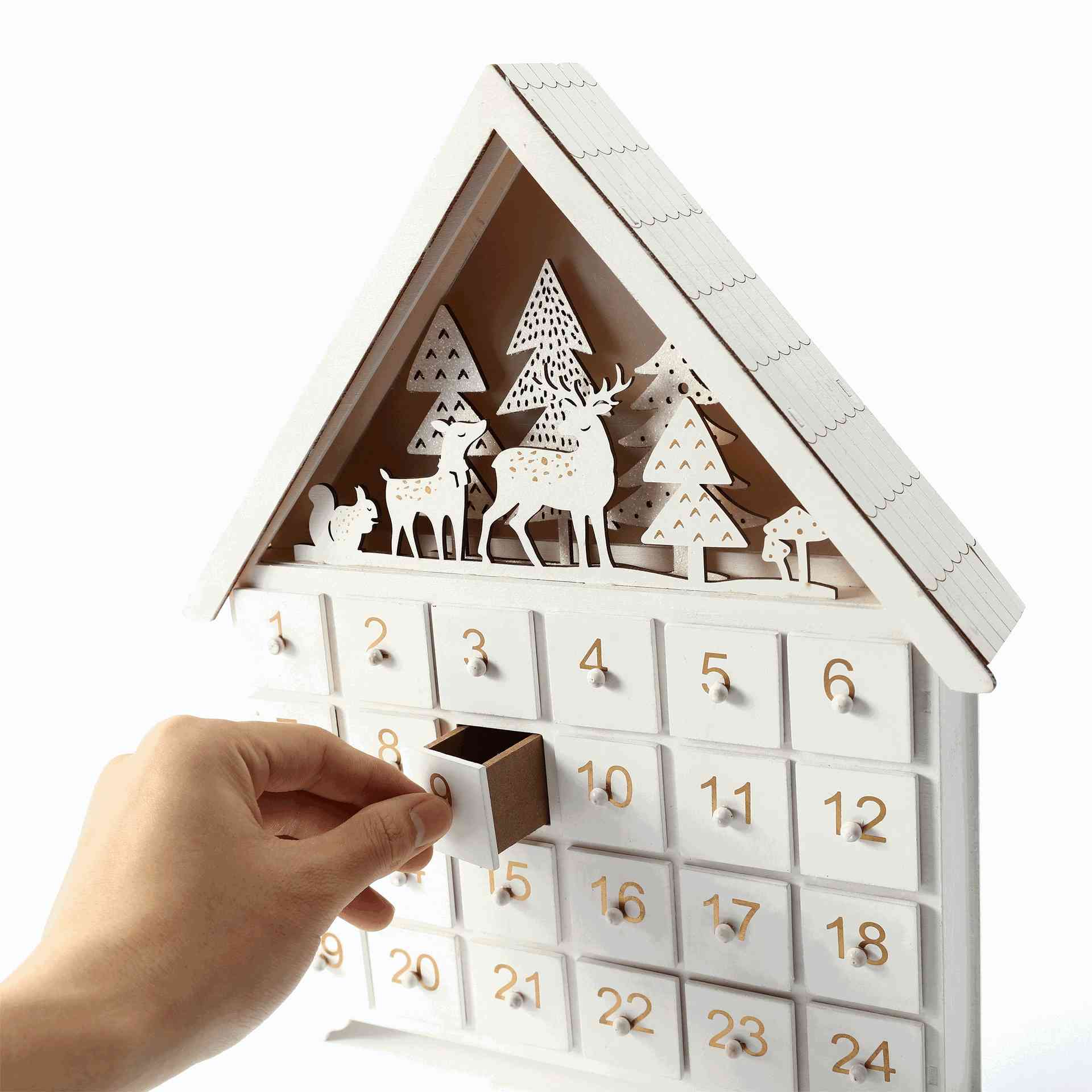 White Forest wooden Christmas Countdown Advent Calendar with 24 drawers, featuring charming forest elements like deer, squirrels, mushrooms, and snow-dusted trees