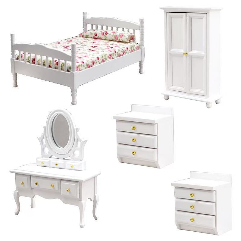 White Miniature 5-Piece Bedroom Set for dollhouses, including a bed, wardrobe, nightstand, dresser, and mirror in 1:12 scale with a sleek white finish