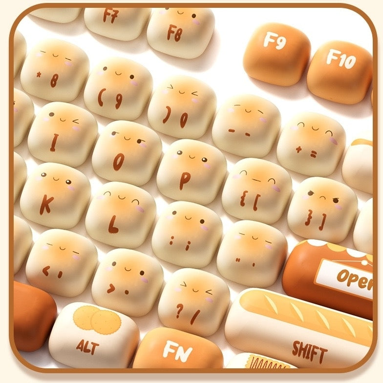Keyboard keys with cute Toasted Bread designs on a white background