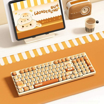Keyboard with toasted bread design keycaps on a desk setup, featuring a monitor and toaster.