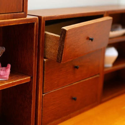 image displaying the Wooden Miniature Cabinet Set in dollhouse setting