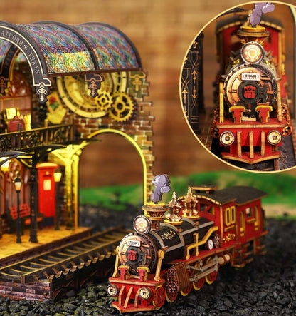 Vintage-style miniature toy train set with detailed station and close-up of train engine.