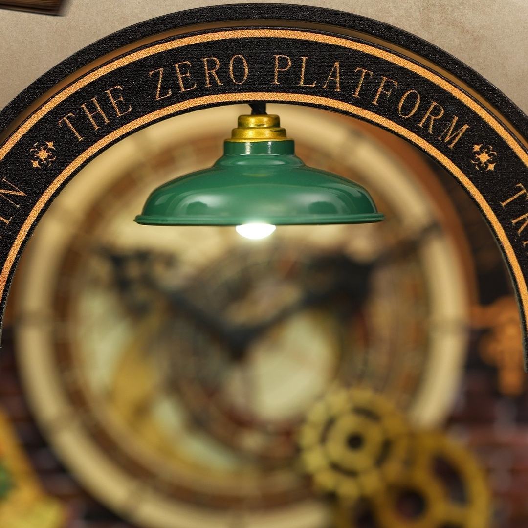 miniature Green lampshade under the arc of the 'The Zero Platform' station