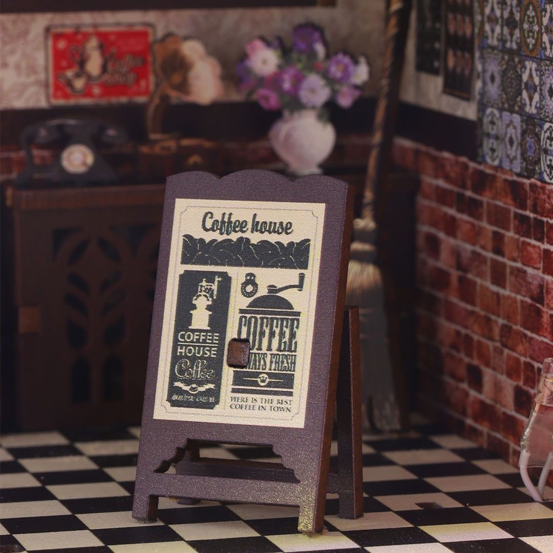 image displaying the miniature details of Magic Coffee Shop Book Nook