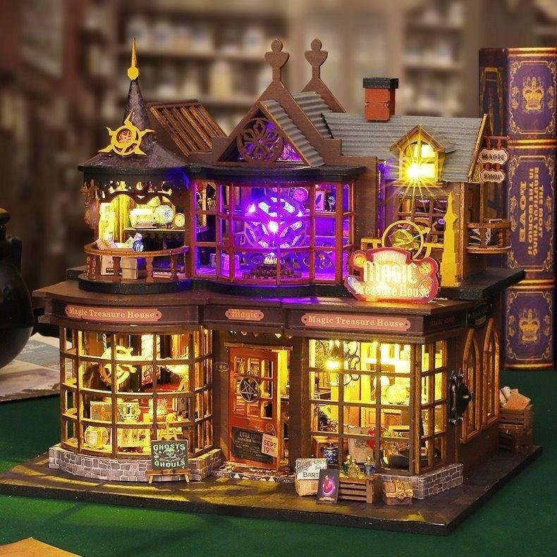 Magic Treasure House DIY Dollhouse Kit featuring a detailed miniature fantasy scene with intricate furniture, colorful decorations, and hidden treasures; designed for crafting enthusiasts to assemble and display as a magical, whimsical addition to any space.